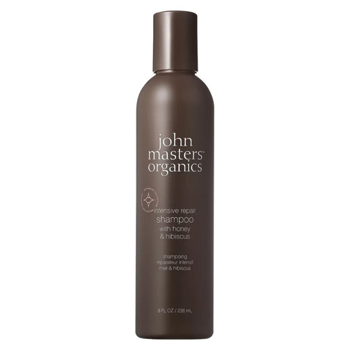 John Masters Organics Intensive Repair Shampoo with Honey and Hibiscus on white background