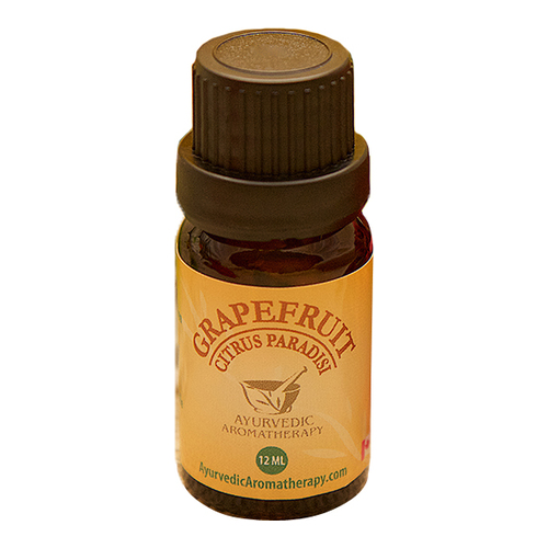 Ayurvedic Aromatherapy Grapefruit Essential Oil on white background