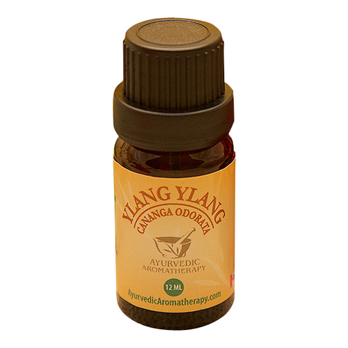 Ayurvedic Aromatherapy Ylang Ylang Essential Oil on white background