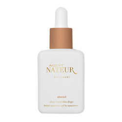 Holi (Sun) Dewy Tinted Serum SPF 50 - Almond on white background