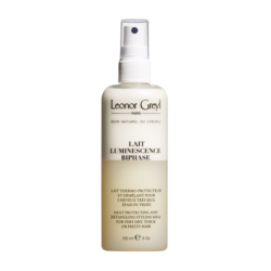 Lait Luminescence Detangling Styling Milk on white background