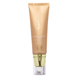 Solar Defense Broad Spectrum SPF 30 - Tinted on white background