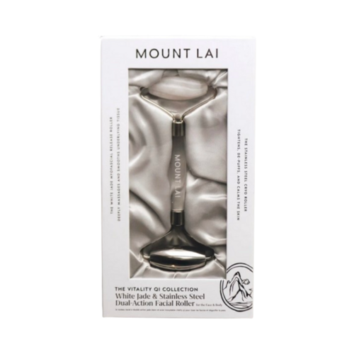 Mount Lai The Vitality Qi White Jade and Stainless Steel Dual Action Facial Roller on white background